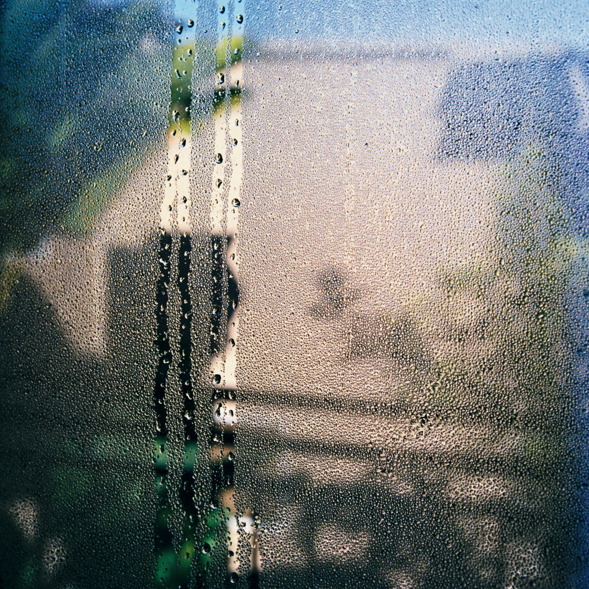 Condensation on a residential window highlighting damp and mould risks addressed through N9 Retrofit & Decarbonisation and ASC1 Asset Safety & Compliance.